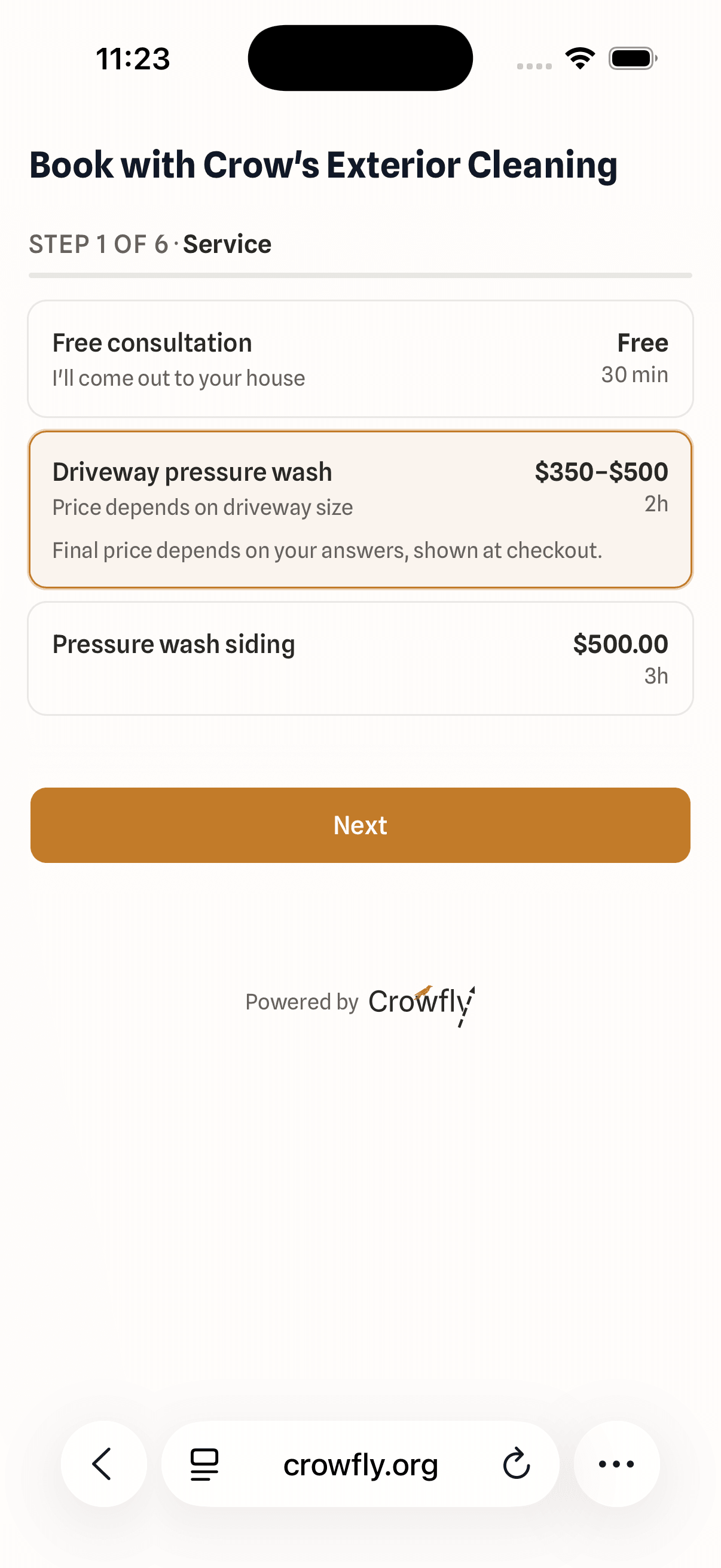 The Crowfly booking widget on a phone, choosing a service from the provider's list.