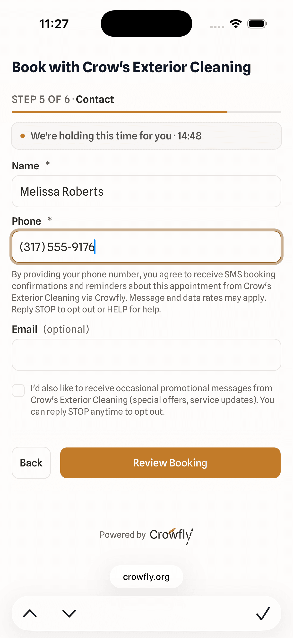The booking widget collecting the customer's contact details.